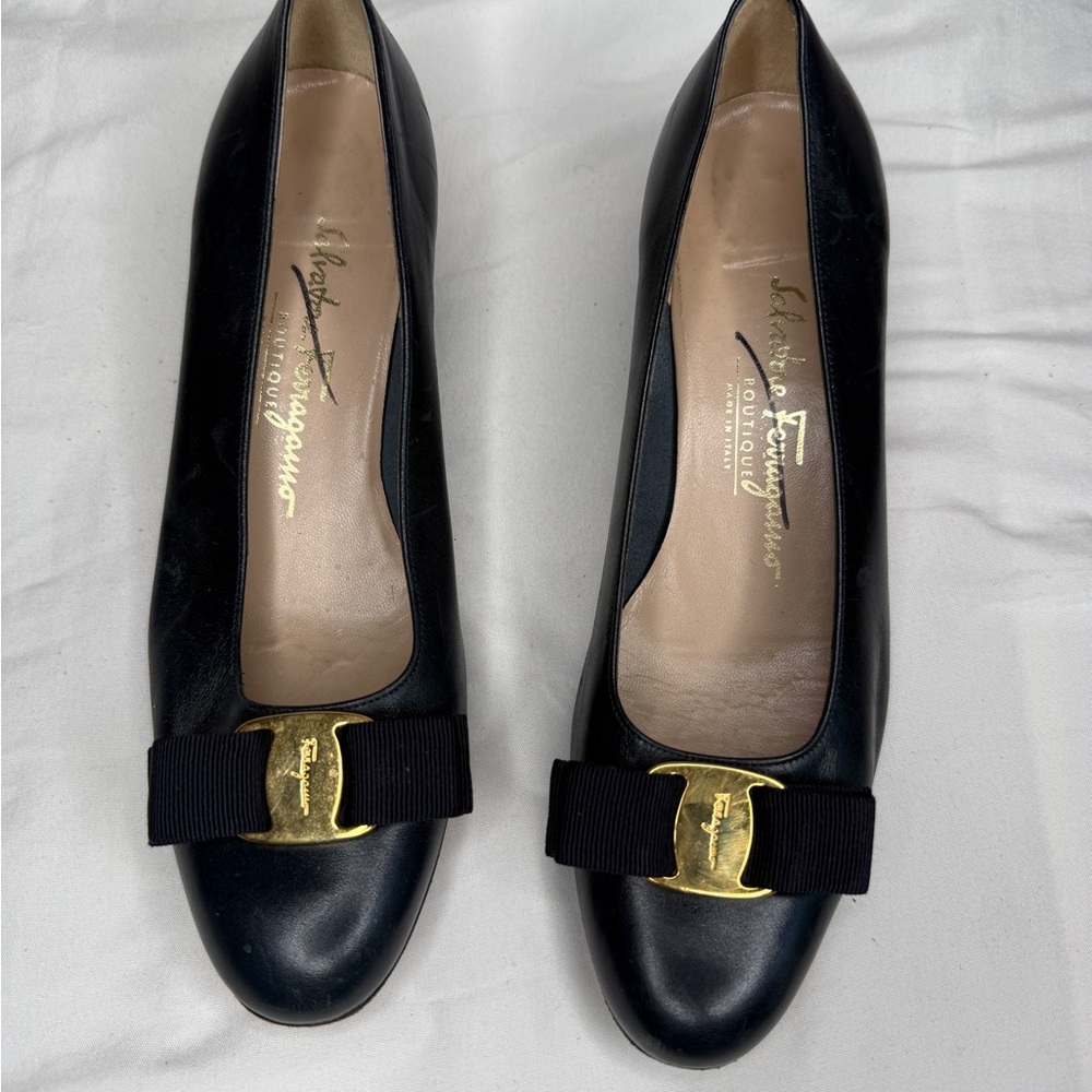 Salvatore Ferragamo Black and Gold Flats